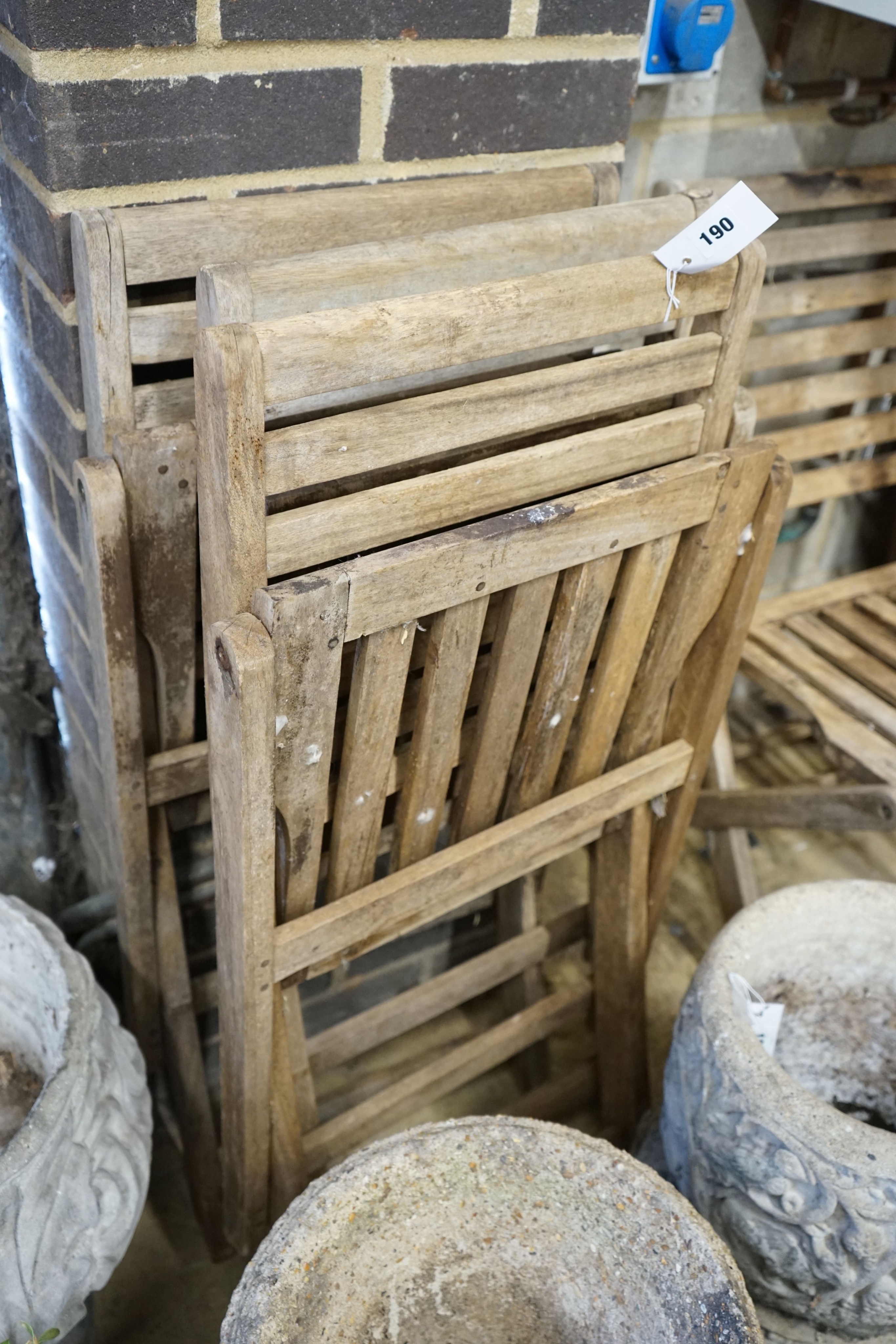 Four wooden folding garden chairs